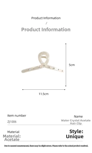 Detailed view of acetate hair claw with rhinestones measuring 11.5cm by 5cm