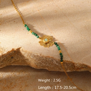 Detail showing 2.5g weight and adjustable length on gold natural stone bracelet