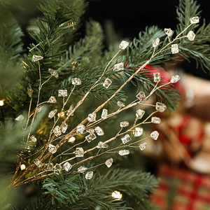 Sparkling gold Christmas tree star ornament with crystal ice droplets for festive decor