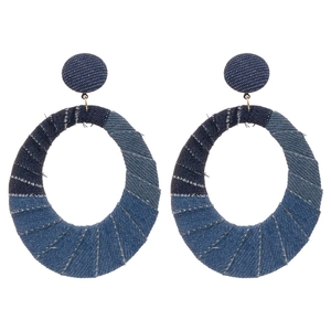 Denim fabric wrapped oval hoop earrings with silver pins in boho street style