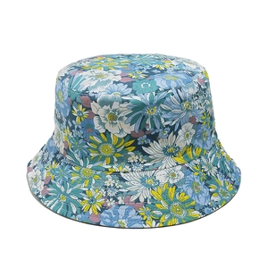 Navy blue sun hat with sunflower floral print for beach travel and sun protection
