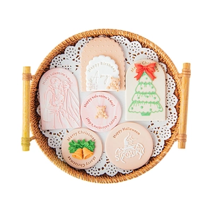 Holiday fondant cookie stamps set including Christmas and birthday themed baking tools