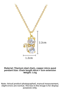 Détails du pendentif chat doré avec zircons et mesures précises de la chaîne
