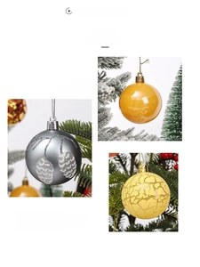 Detail of 6cm Christmas ornaments showing glossy yellow, matte grey and crackle finishes