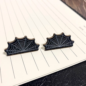 Halloween asymmetric black wooden earrings with spider web and bat wing design
