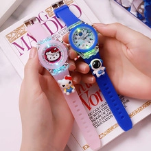 Luminous kids silicone watches featuring pink Hello Kitty and blue astronaut designs