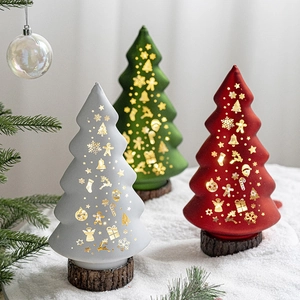 Illuminated glass Christmas tree decor with wooden base in white green and red colors