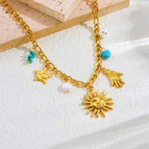 Vintage gold-plated stainless steel necklace with sun face, Hamsa palm and pearl pendants