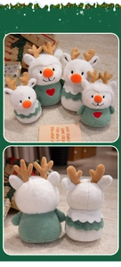 Detail of plush snowman reindeer toys with soft white fur and festive green outfits