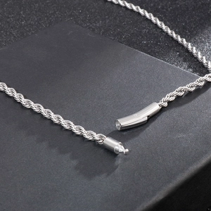 Polished silver stainless steel rope chain necklace featuring a secure cylindrical clasp
