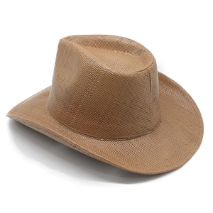 Close-up of the vintage brown wide-brim cowboy hat featuring intricate woven texture