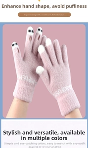 Detailed view of pink knitted touchscreen gloves with contrast white fingertips and ribbed cuffs