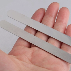 Detail of DIY C-shaped stainless steel bracelet blanks in brushed and mirror finishes