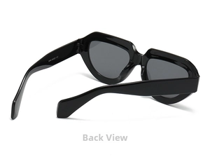 Detail view of the wide black temples with model code 5494 on trendy irregular sunglasses