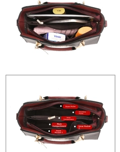 Detailed interior of a large handbag with multiple compartments and organized sections