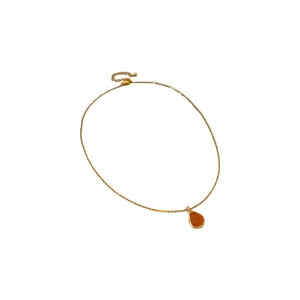 Gold-plated necklace with pear-shaped orange gemstone pendant on a white background