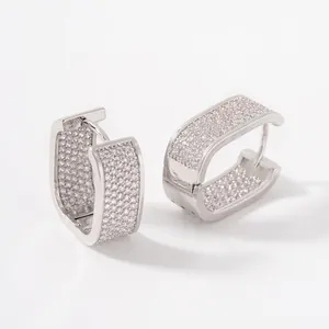 Detail of silver rectangular huggie earrings with cubic zirconia pavé and dimensions
