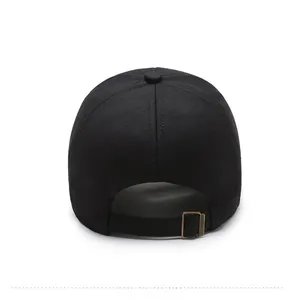 Rear view of black cotton baseball cap with adjustable antique bronze metal buckle