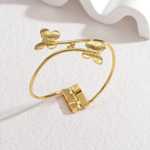 Elegant 18K gold plated stainless steel butterfly hinge bangle with dual butterfly motif
