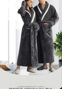 Detail of dark gray flannel bathrobe featuring thick diamond texture and contrast piping