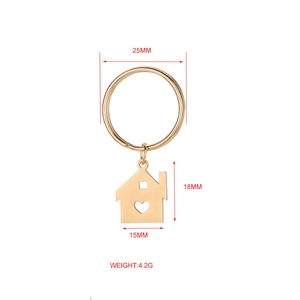 Gold mirror-polished stainless steel house pendant keychain with heart cutout and dimensions
