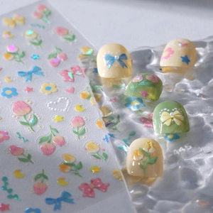 Floral tulip and bow self-adhesive nail stickers with pearlescent finish on rippled glass