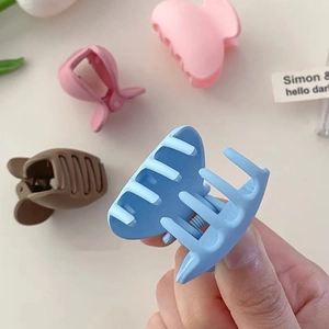 Matte finish small hair claws in multiple colors including blue, pink and brown