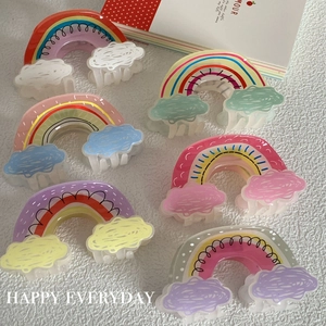 Set of six colorful acrylic hair claws with rainbow and cloud graffiti patterns