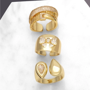 Three-piece gold plated adjustable ring set with zircon bow and water drop designs
