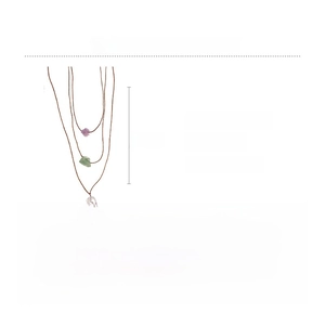 Detailed view of natural crystal pendant set showing dimensions and irregular stone texture