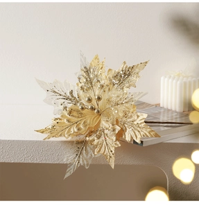 Close-up of golden artificial Christmas flower with glitter edges for holiday tree decor