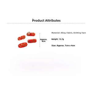 Close-up of 4pcs red knitted hair clips with Chinese characters and dragon detail