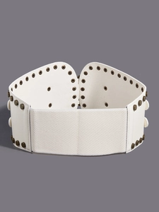 Detail of white corset belt featuring vintage bronze metal buckles and rivet decorations