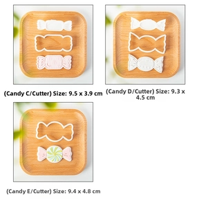 Detailed candy-shaped cookie cutters with internal embossing stamps for DIY baking