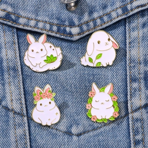 Cute four-piece set of white rabbit enamel pins for clothing and bag decoration