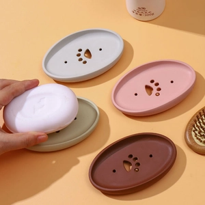 Silicone soap dish with cat paw drain holes and cleaning brush in assorted colors