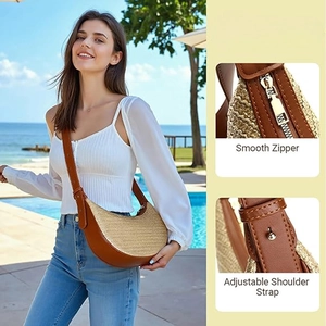 Detail view of woven crescent bag featuring smooth zipper and adjustable strap
