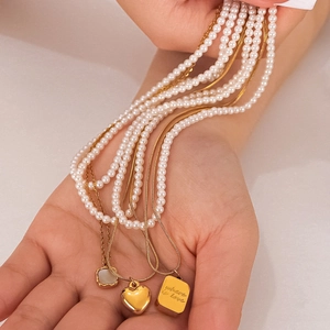 Layered 18K gold plated heart necklace with pearls and engraved where is love tag