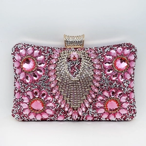 Detailed view of pink and silver rhinestone floral patterns on a luxury evening clutch bag