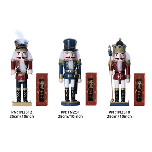 Three 25cm wooden nutcracker ornaments including drummer and king in gift boxes