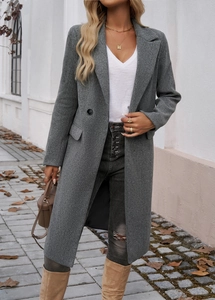 Full-body street view of a grey mid-length lapel coat with professional tailoring