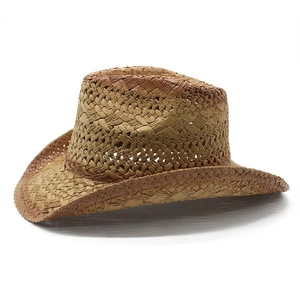 Detail of brown woven straw cowboy hat featuring wide curved brim and western style crown