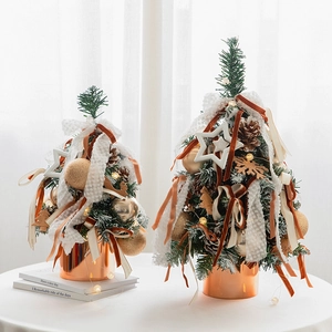 Mini Christmas tree set with pine cones and orange ribbons on bronze metal bases