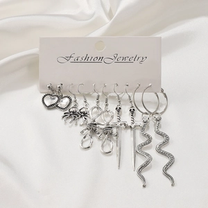Retro silver earrings set featuring heart spider snake and sword designs on card