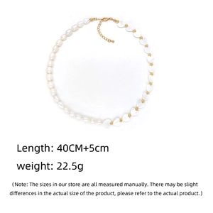Detailed view of baroque pearl necklace with heart shell and dimension specs at 40cm length