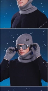 Detailed view of grey winter knit hat, neck warmer, and non-slip gloves with ribbed texture