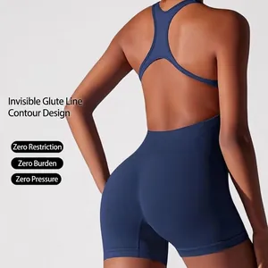 Dark blue seamless yoga bodysuit with cross-back straps and butt-lifting design for fitness