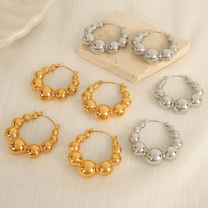 Minimalist metallic gradient sphere hoop earrings in gold and silver finish