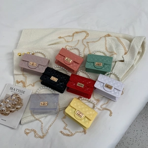 Mini jelly crossbody bags with quilted pattern, pearl handles and chain straps in 8 colors