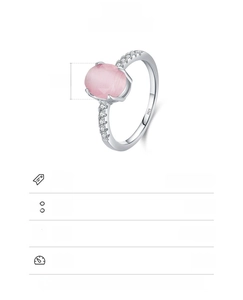 Detail of S925 sterling silver ring with 7x9mm pink cat eye stone and zircon accents
